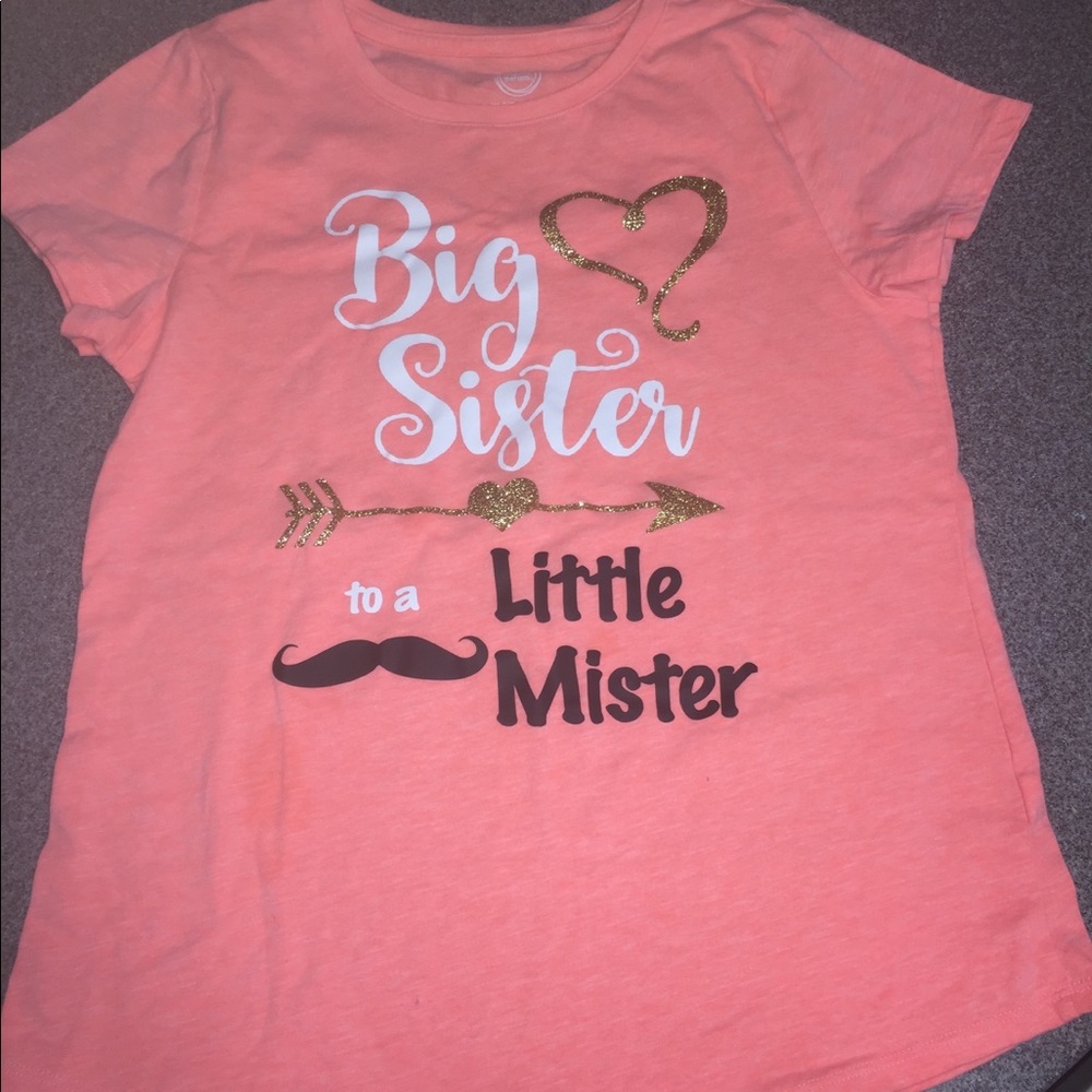 Big sister shirt to a little brother. Size 14-16.